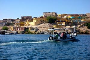 Taking a boat to Philae Temple located on an island